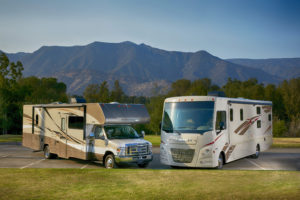 RV and camper van with mountains
